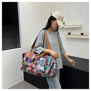 Large fitness travel bag with colorful graffiti pattern and separate shoe compartment