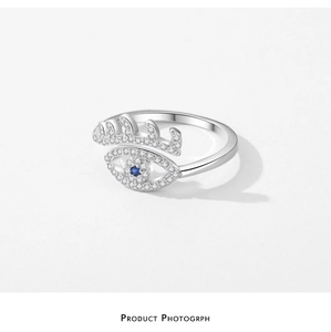 Detailed close-up of S925 sterling silver evil eye ring with micro-pave zirconia stones
