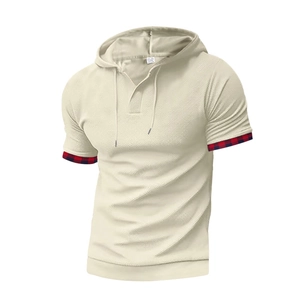 Detail of waffle knit texture and red-black checkered trim on beige men hoodie set