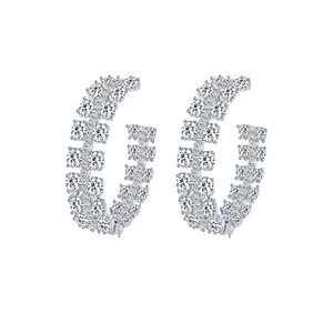 Elegant silver C-shaped hoop earrings with three rows of clear zircon stones