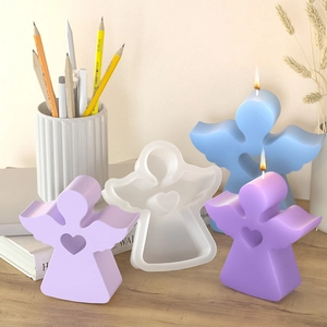 3D angel silicone mold for Easter candles with heart-shaped detail and finished resin crafts