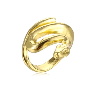Detailed macro shot of a coiled golden snake ring with scales and textured serpent head