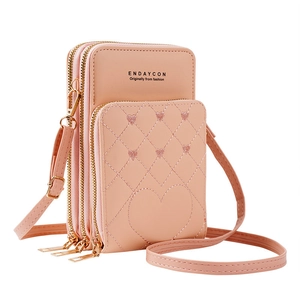 Pink heart-embroidered crossbody phone bag with three zippered layers and fine PU leather