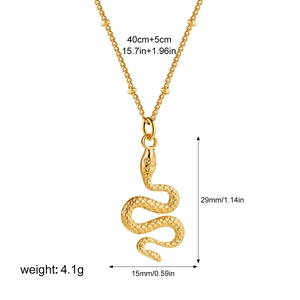 Detail showing gold snake pendant with textured scales and exact dimension specifications