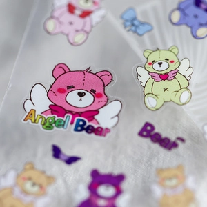 Self-adhesive nail stickers featuring cute colorful angel bears and wings patterns