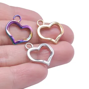 Polished hollow heart charms in rainbow, gold, and silver finish for DIY jewelry making
