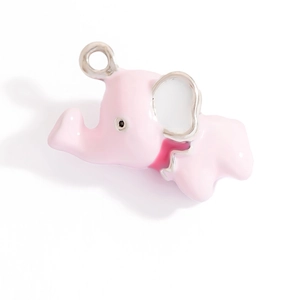 Close-up of cute pink enamel elephant charm with silver ring for jewelry making