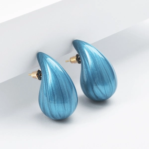 Polished blue chubby teardrop stud earrings for women with a textured glossy finish
