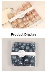 Detail of assorted Christmas balls in champagne pink and deep blue glitter matte finishes