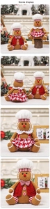 Close-up of sitting gingerbread man chef plush dolls with knitted lace detail on table