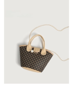 Top view of brown bucket bag with pearl clasp and luxury geometric pattern