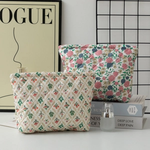 Floral quilted travel cosmetic bags in two sizes with elegant vintage patterns and zippers