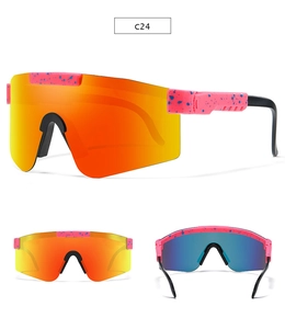 Detail view of pink speckled sports sunglasses with orange gradient mirror lenses