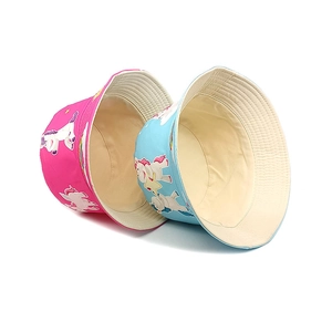 Kids unicorn print sun hats in rose red and light blue, breathable cotton bucket hats