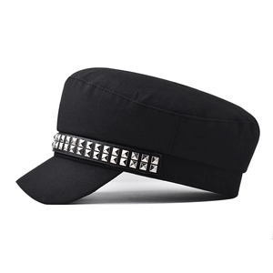 Detail of double-row silver square rivets on the black cotton punk military flat top cap