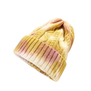 Chic tie-dye cable knit beanie for women featuring yellow and pink gradient warm colors