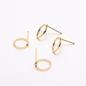 Macro view of 18k gold plated C-shaped half-round earring findings for DIY jewelry