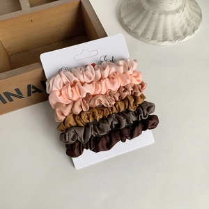 5-pack earth tone satin scrunchies set on white card with elegant gradient colors