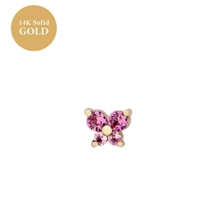 Macro shot of 14K solid gold butterfly stud earring with four round pink gemstones