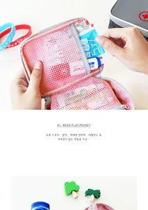 Detail of travel medical bag with pink mesh pocket holding pills and bandages