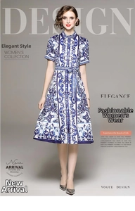 Detailed view of blue and white floral print midi dress with shirt collar and waist belt