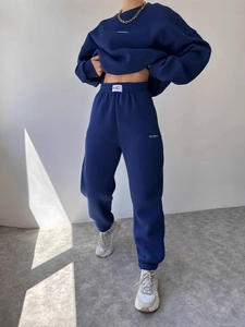 Women's dark blue casual lounge set featuring a crewneck sweatshirt and joggers