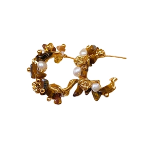Vintage golden C-shaped hoop earrings with white pearls and brown tiger eye stone beads