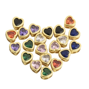 Colorful heart-shaped zircon charms in gold plating arranged in a large heart shape