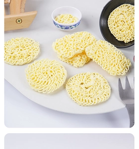 Miniature dollhouse ramen noodles with round and rectangular dry noodle cake details