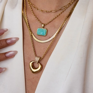 Layered 18K gold plated stainless steel necklace set with green gem and heart pendant