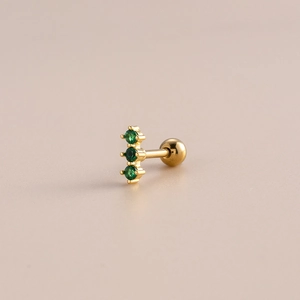 Golden cartilage earring with three green cubic zirconia and screw ball back closure