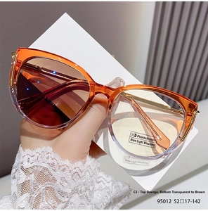 Cat eye photochromic blue light glasses with orange and transparent purple gradient frames