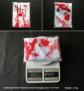 Detailed view of Halloween blood-stained socks in packaging with weight and dimensions