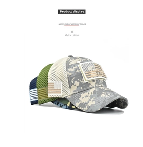 Close-up of tactical camo baseball caps with mesh back and Velcro American flag patches