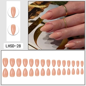 Glossy nude pink short almond press-on nails with 24-piece full set sizing display