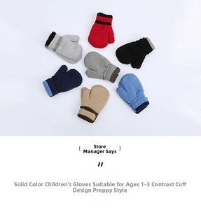 Close-up of color-block knit mittens for toddlers aged 1-3 with ribbed contrast cuffs