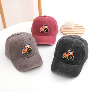 Detailed embroidery of cartoon tractors on cotton baseball caps in three colors