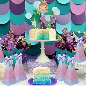 Mermaid party gift box featuring purple gradient scales, glitter fin and a purple ribbon bow