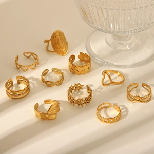 Detailed set of 10 vintage style 18K gold heart and leaf engraved adjustable rings