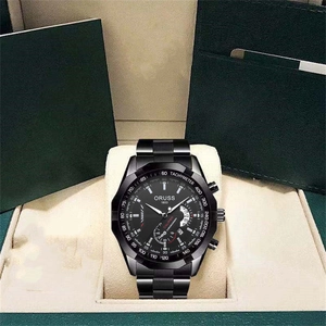 Macro detail of ORUSS black stainless steel chronograph watch with date window and metal band