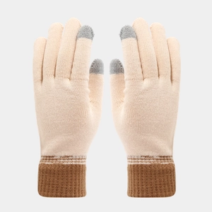 Detail of knitted touchscreen gloves with contrast cuffs and conductive fingertips