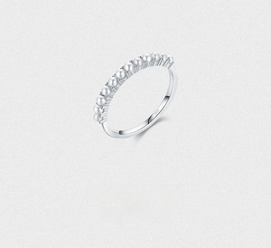 Detailed macro view of S925 sterling silver ring showing pearl inlay and hallmark stamp