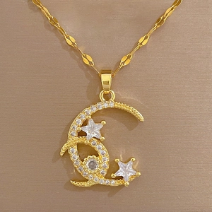 Elegant gold titanium necklace featuring a crescent moon and star pendant with zircons