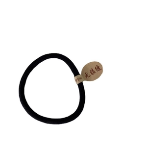 Minimalist black seamless high-elastic hair tie with premium woven texture and tag