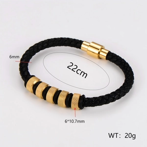Men's braided leather bracelet with gold metal beads and magnetic clasp on white background