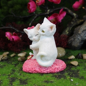 Romantic resin cat figurine with pink rose base and heart ornament for Valentine's Day decor