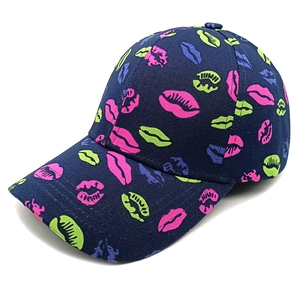 Detailed view of navy canvas baseball cap with vibrant multi-colored lip patterns