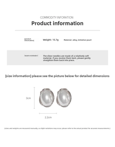 Detailed view of vintage oval pearl earrings with silver textured alloy frame and dimensions