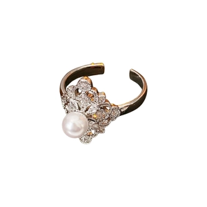 Elegant adjustable rhodium ring with white pearl, zircon accents and hollow floral pattern
