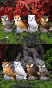 Detailed view of four resin owl figurines with realistic feather textures on stone bases